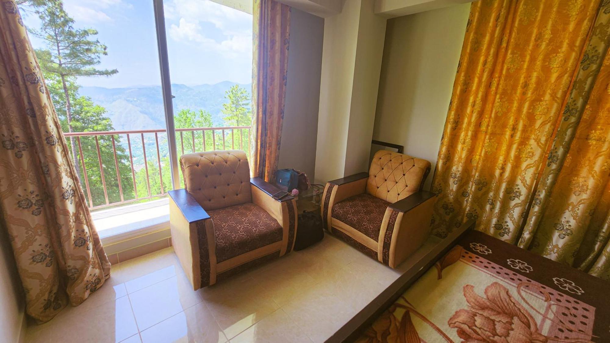 Aqua Apartment Murree Bagian luar foto